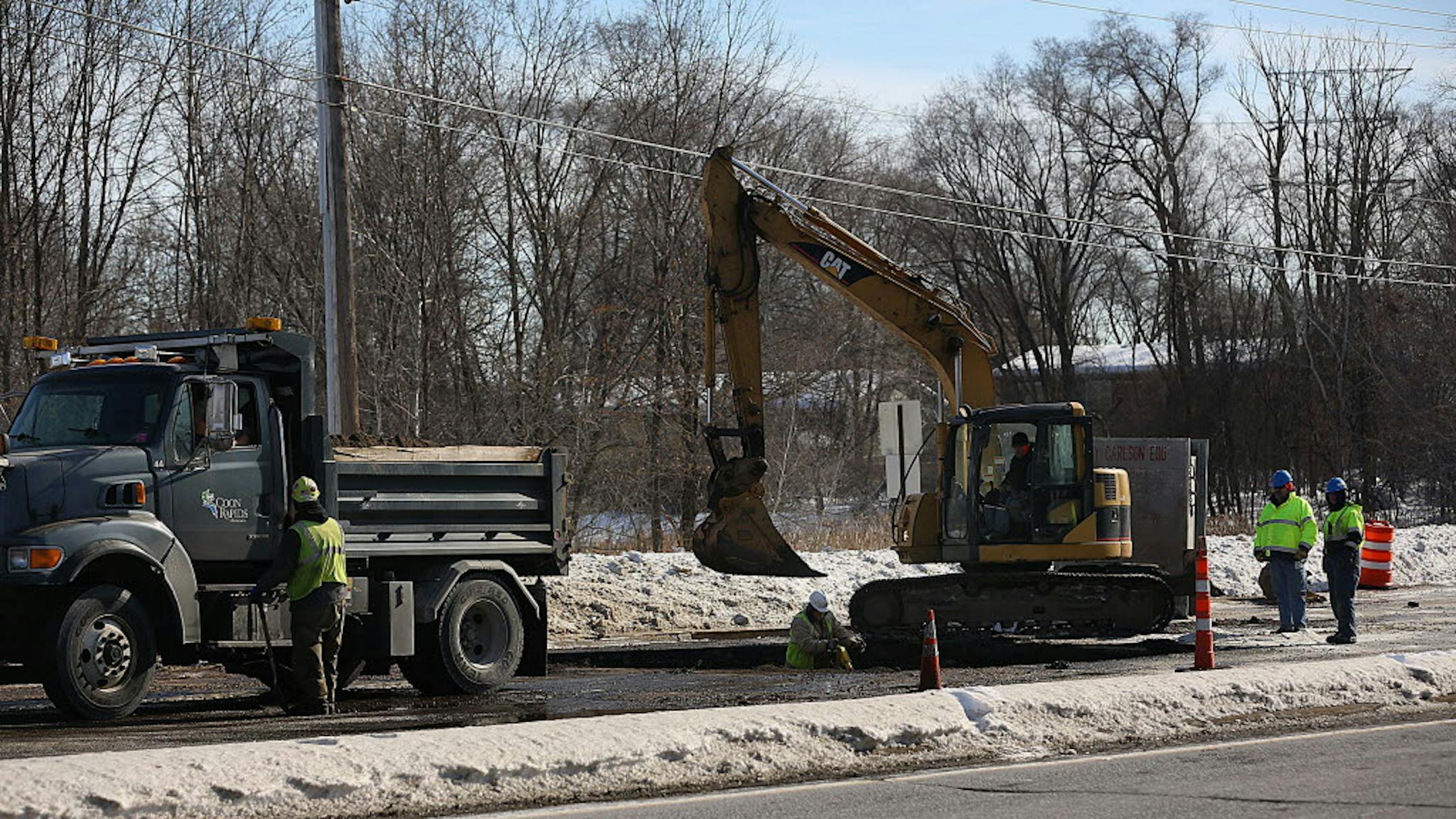 City workers from Coon Rapids and a contractor repaired a break in a water main in February 2014, one of many cities that had frozen pipes across the metro after more than 40 days of subzero temperatures.