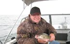 Cliff "Buddy'' Buland of Bloomington caught this walleye on Mille Lacs. He loved to hunt and fish and spend time at the family cabin near Outing. His 