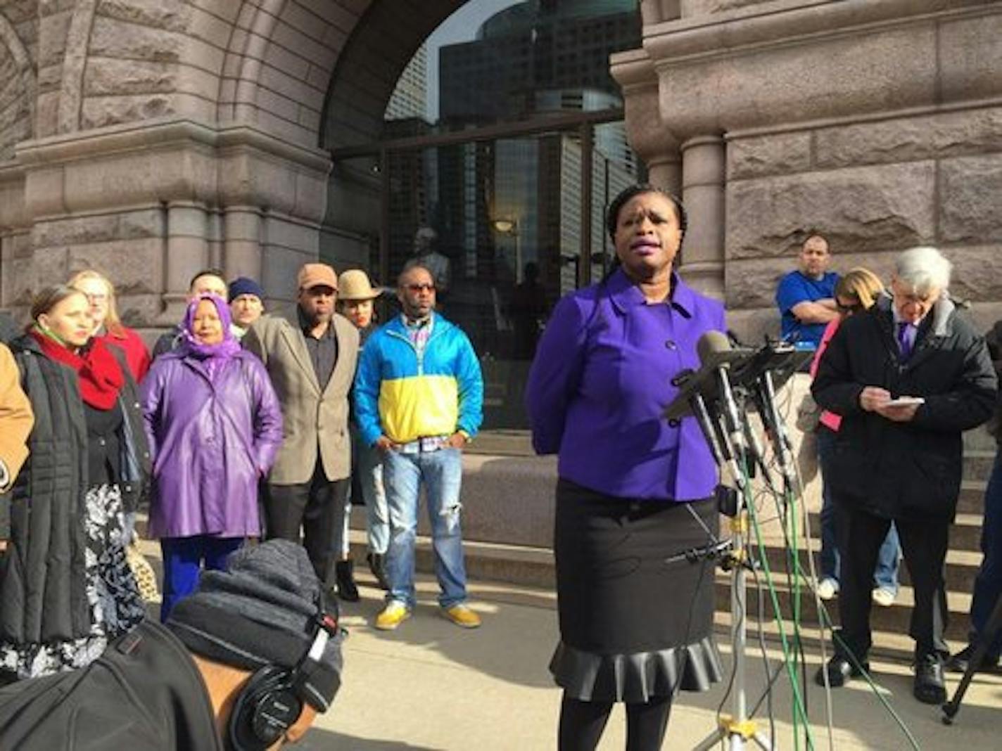 Nekima Levy-Pounds and other civil rights leaders speak in front of Minneapolis City Hall on Friday about the pending decision in the Jamar Clark case.