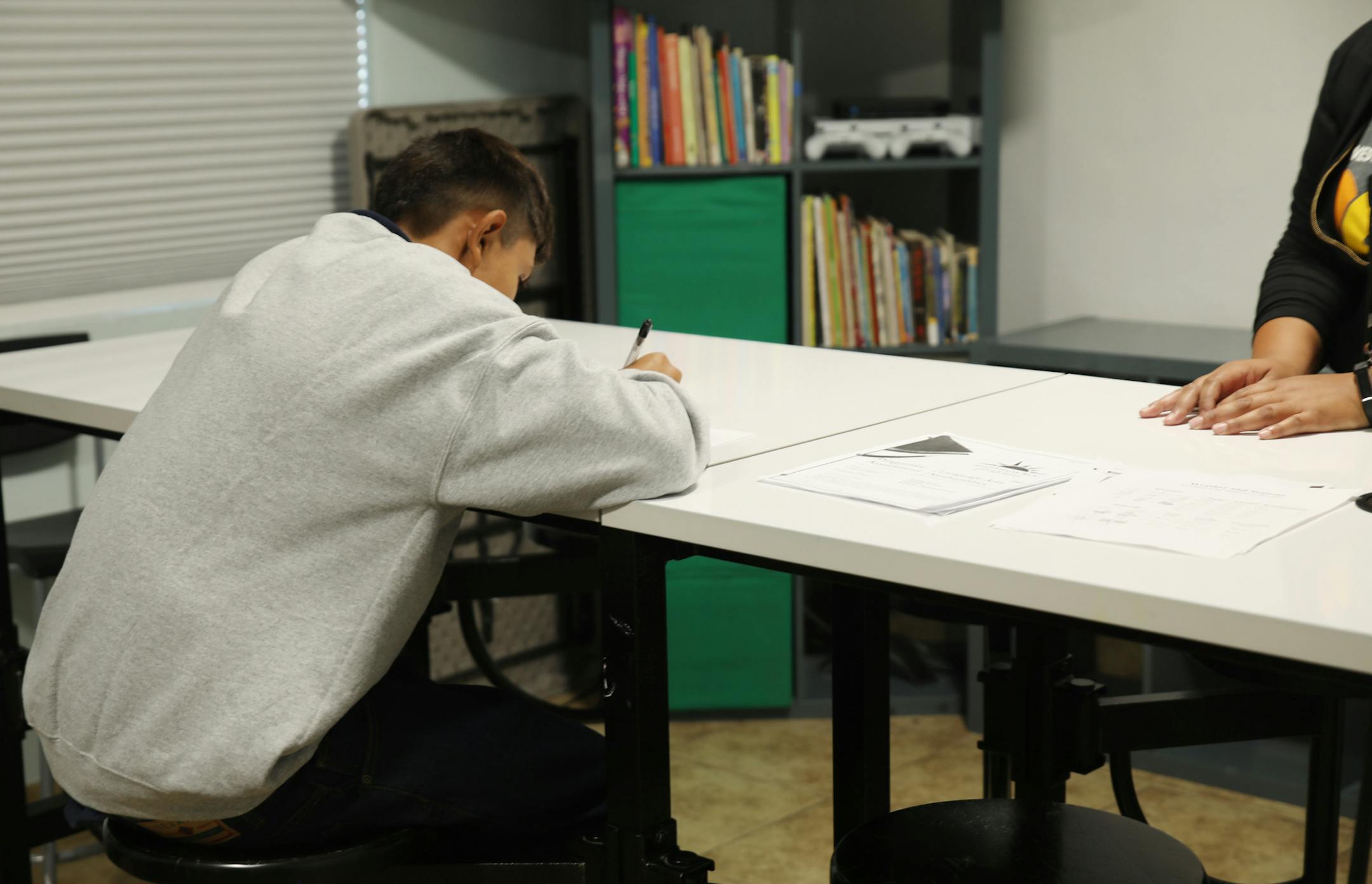 This undated photo provided by the U.S. Department of Health and Human Services' Administration for Children and Families shows part of a shelter used to house unaccompanied foreign children in San Diego, Calif. (HHS' Administration for Children and Families via AP)