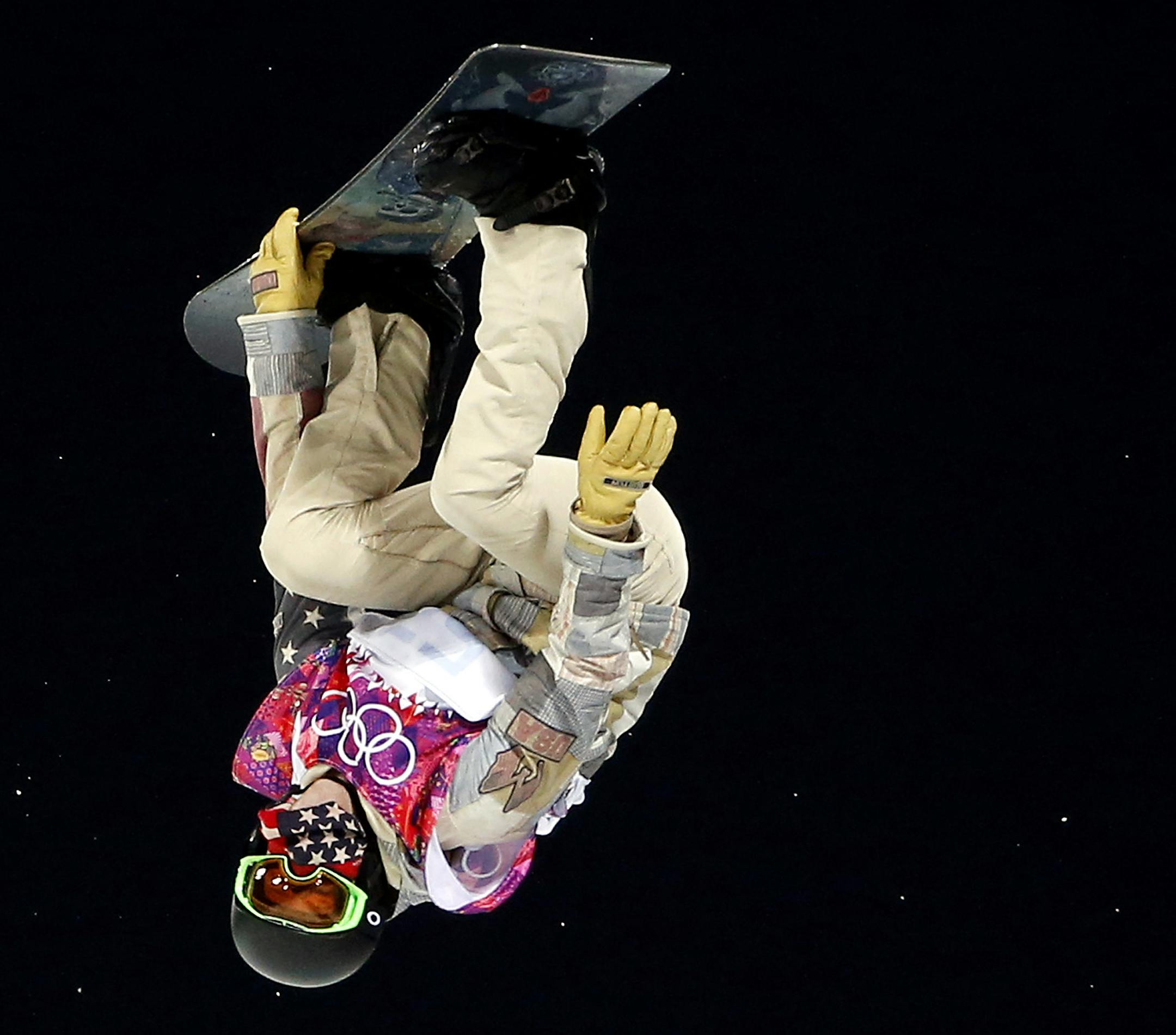 Shaun White during his final run of the finals. Shaun White (Carlsbad, Calif.) placed fourth in the men's snowboard halfpipe Tuesday evening at the Sanki Sliding Center in Sochi's Mountain Cluster. After falling on his first run, White scored a 90.25 on his second, but it wash's enough to earn him a podium spot. The gold medal went to Switzerland's Iouri Podladtchikov, who received a 94.75. Japan took the silver and bronze as Ayumu Hirano claimed the silver with a 93.50 and Taku Hirano won the b