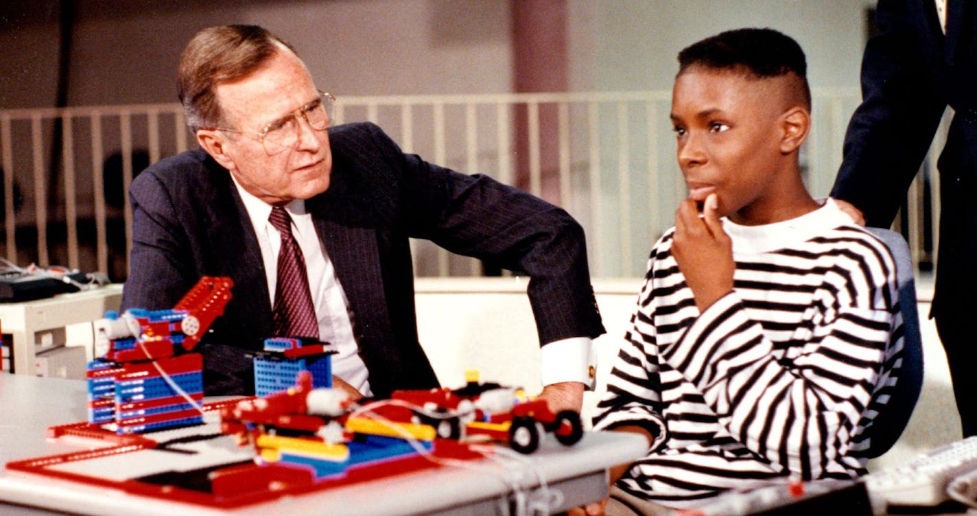 Elijah Pughsley, pictured in 1991, pondered a moment before he answered President George H.W. Bush's question during a visit to the Saturn School of Tomorrow in St. Paul.