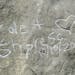 Graffiti spelling "Cole & Shpresa 10/10/2013" is seen carved into the Pompeys Pillar National Monument in Montana.