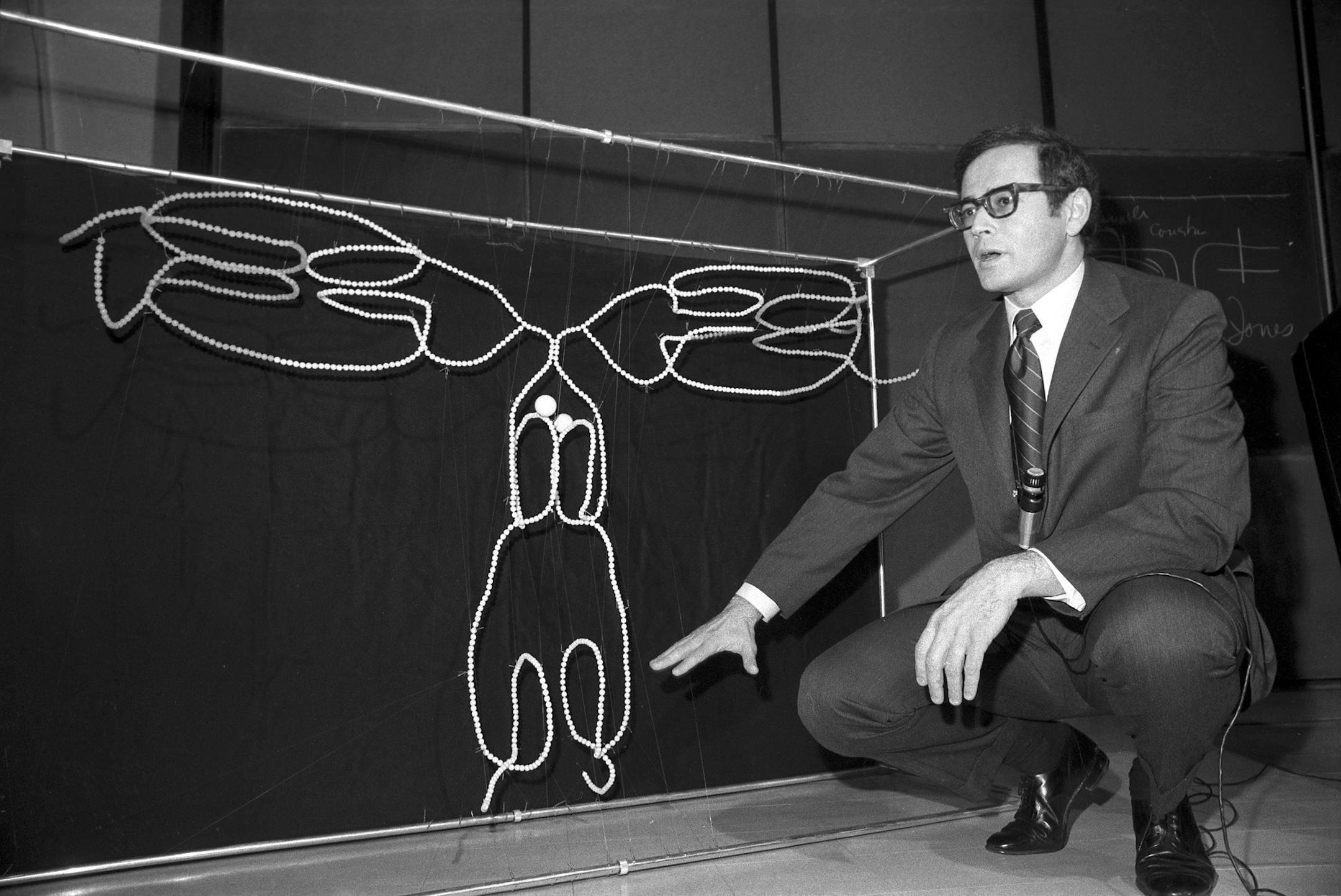 FILE -- Dr. Gerald Edelman explains the immunology research that won him the 1972 Nobel Prize in Medicine, at Rockefeller University in New York, Oct. 12, 1972. Edelman, whose research helped establish how antibodies function and later contributed key findings in neuroscience, died on May 17, 2014. He was 84. (Don Hogan Charles/The New York Times)