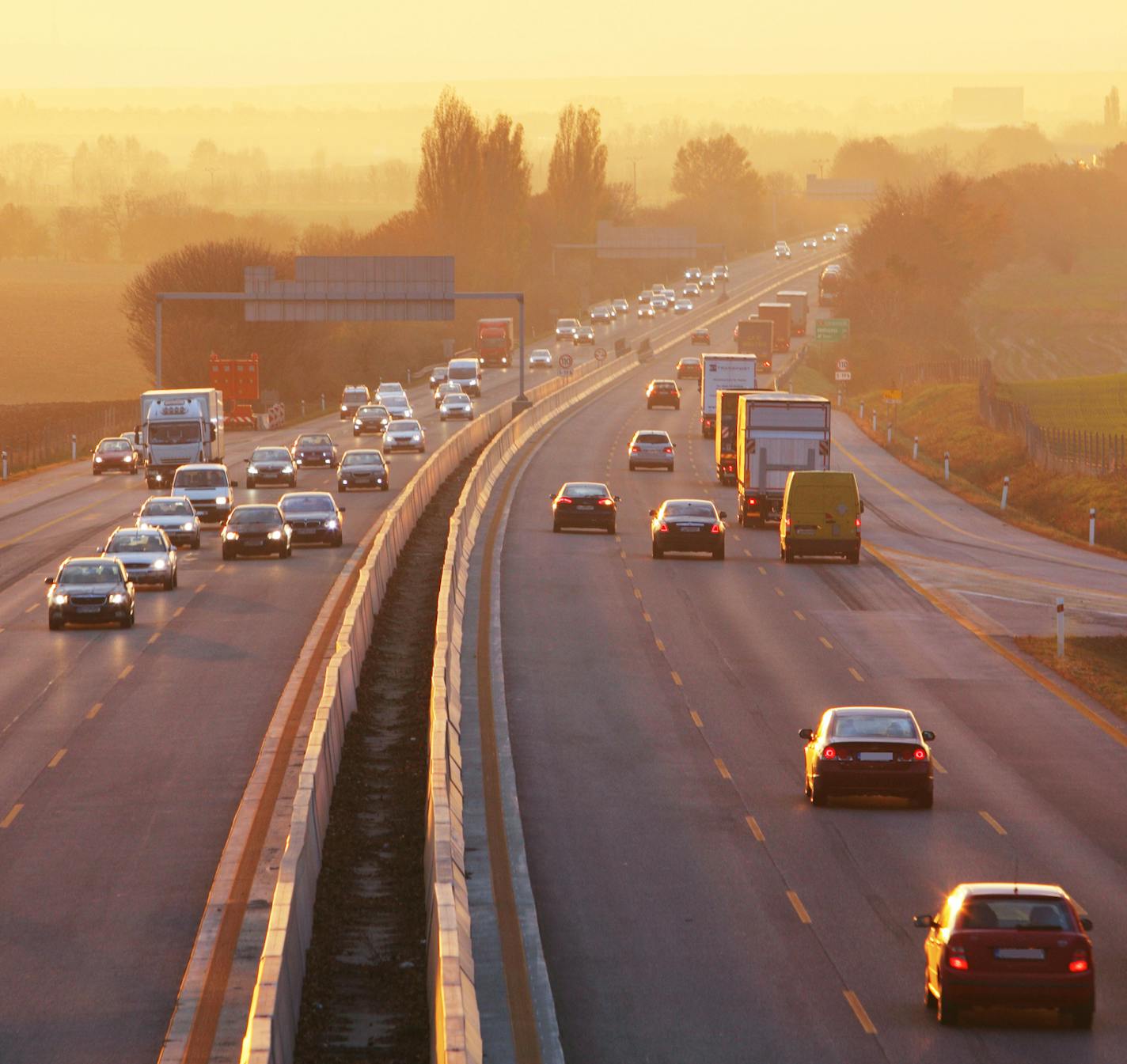 Traffic on highway with cars.