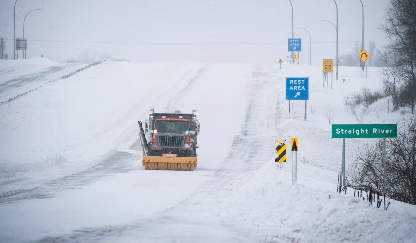 Minnesota Department of Transportation called out the "ice breaker" to try to break up the ice covered lanes of I-35 south of Owatonna, Minn. Dangerous cold once again gripped the Upper Midwest on Monday, Feb. 25, 2019, following a deadly blizzard that caused multiple pileups, paralyzed highways, and stranded motorists and anglers. The National Weather Service posted wind chill advisories or warnings for much of the Dakotas, Minnesota and Wisconsin early Monday. (Glen Stubbe/Star Tribune via AP)