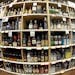 FILE - This June 16, 2016 file photo made with a fisheye lens shows bottles of alcohol during a tour of a state liquor store in Salt Lake City. A larg