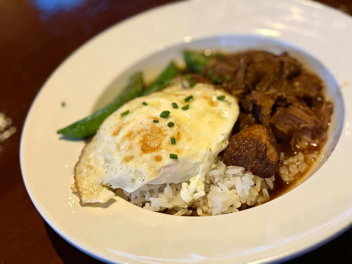 George and the Dragon Asian Hangover, 5 spice pork, egg, snap peas on Jasmine rice.