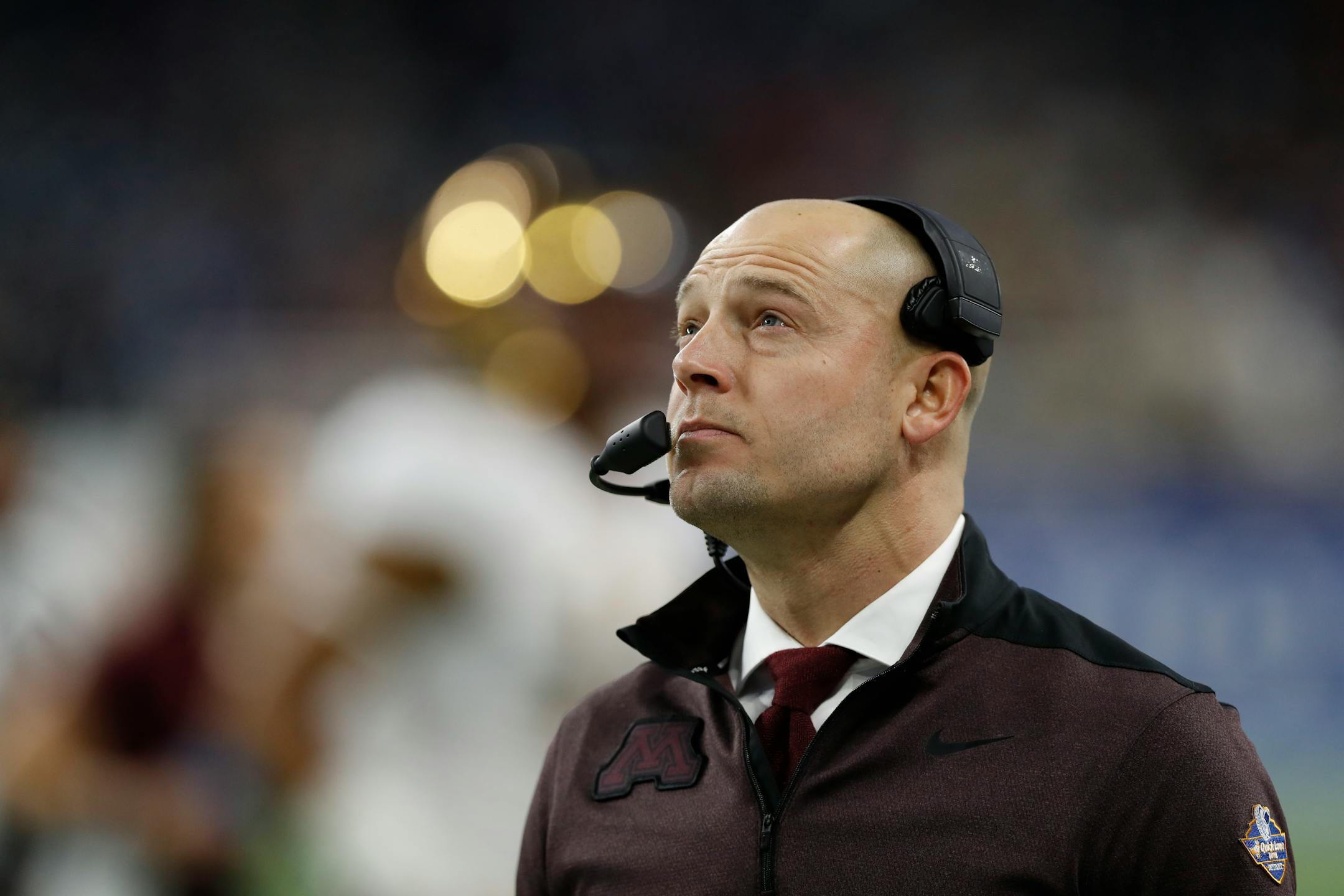 Minnesota head coach P.J. Fleck walks on the sidelines during the Quick Lane Bowl NCAA college football game against Georgia Tech, Wednesday, Dec. 26, 2018, in Detroit. Minnesota won 34-10. (AP Photo/Carlos Osorio)