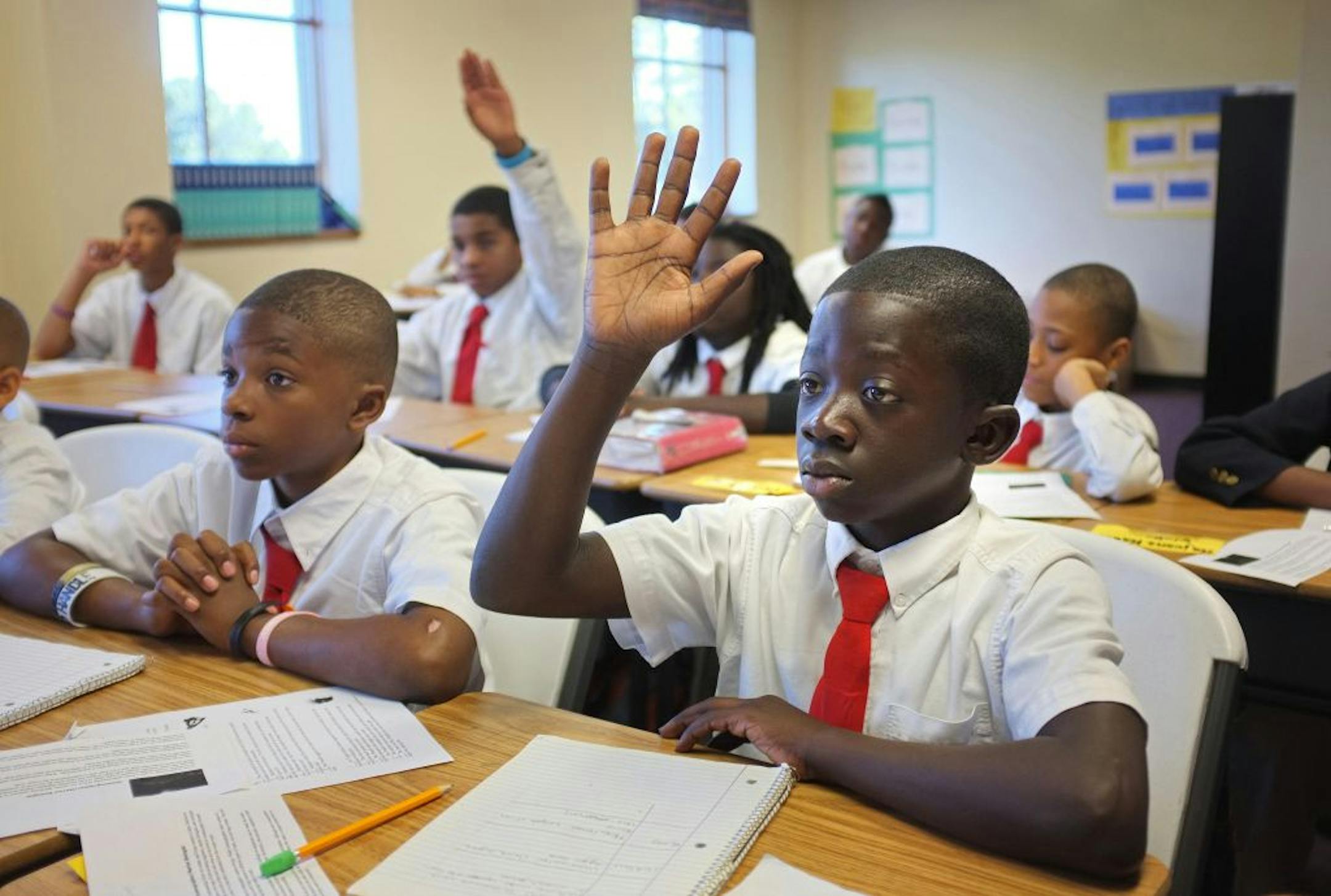 Willie Gates (right) and Rayquan Moore (left) work on math in Ms. Punjabi's 6th grade class at Best Academy. Best Academy is a Minneapolis charter school that offers single-sex instruction. It has two schools under one roof: Best Academy, a K-8 boys school, and Sister Academy, a schools for girls in grades 5-8.