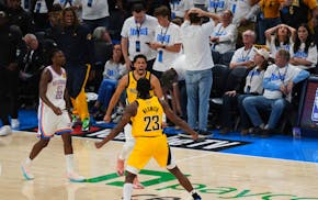 Pacers guard Tyrese Haliburton celebrates with forward Aaron Nesmith (23) after making a three-pointer in the closing seconds of Game 1 of the NBA Fin