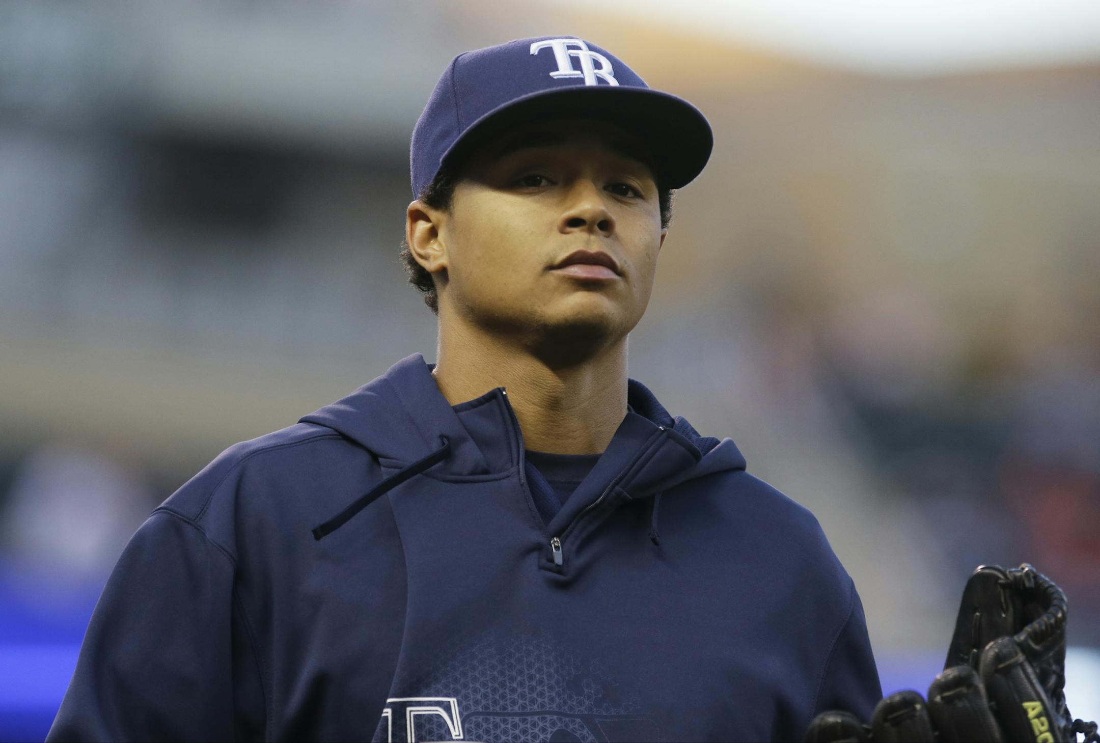 Tampa Bay Rays pitcher Chris Archer heads to the dugout from the bullpen before the first inning of a baseball game against the Minnesota Twins, Friday, Sept. 13, 2013 in Minneapolis. (AP Photo/Jim Mone)
