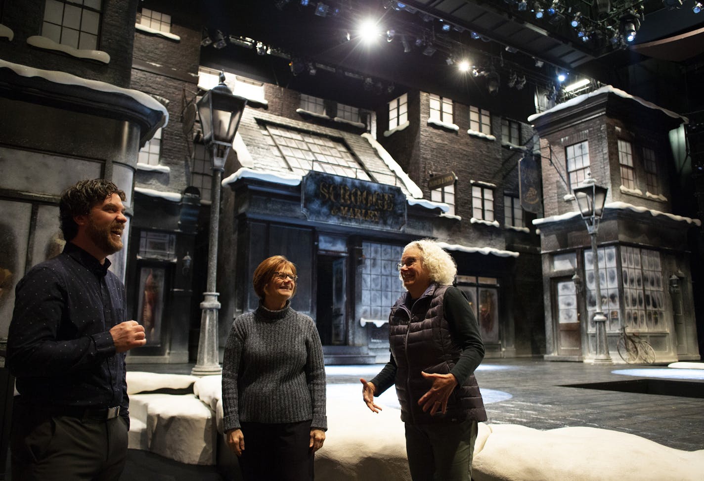 Hunter Gullickson, Access Manager at the Guthrie Theater, left, talks with sign language interpreters Jan Radatz, middle, of Roseville, and Lauri Krouse, of Minneapolis, before a matinee presentation of "A Christmas Carol" on Thursday, Dec. 6, 2018, at the Guthrie in Minneapolis. This is the 25th year That Radatz and Krouse have worked together as interpreters for the production. ] Kevin Martin &#x2022; kevin.martin@startribune.com About 90,000 patrons are expected to see "A Christmas Carol" thi