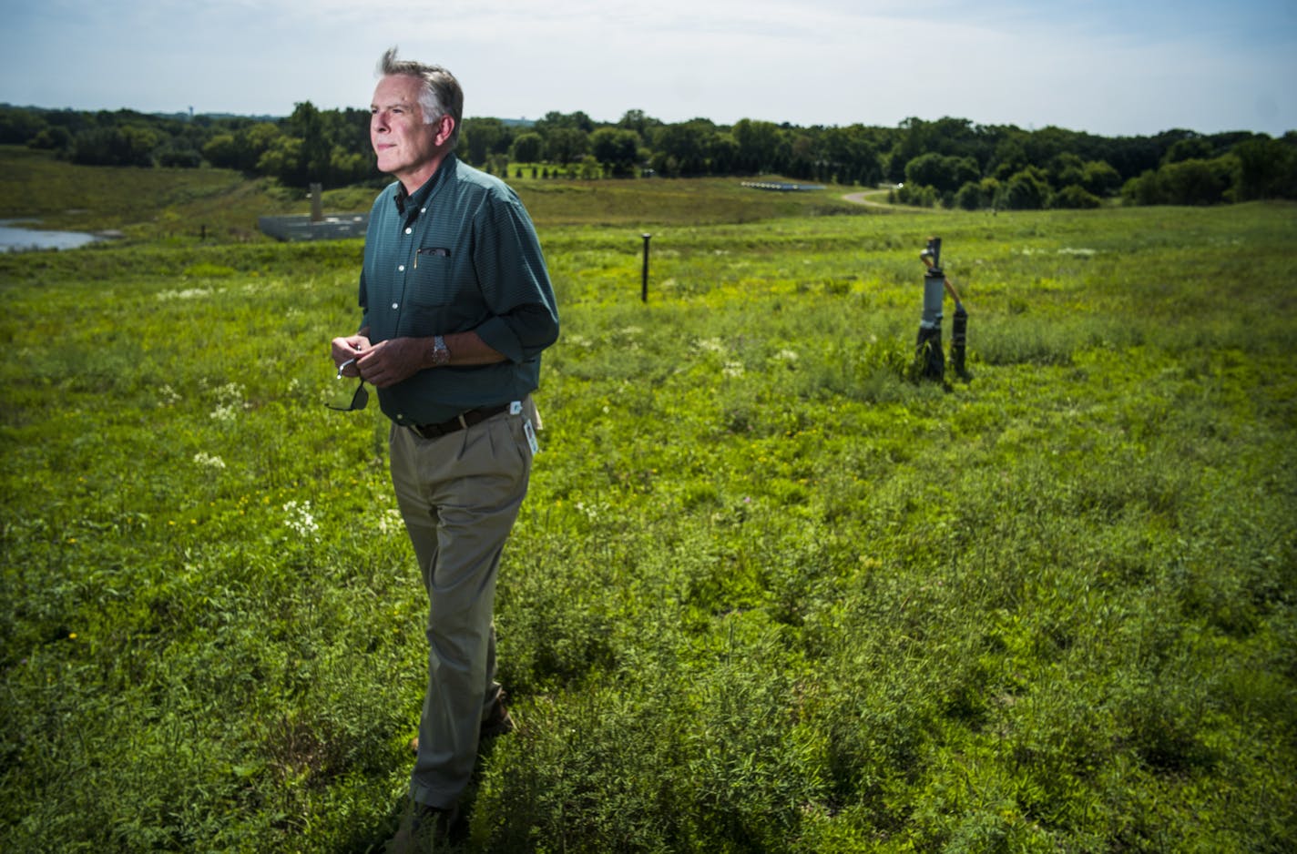 Walker Smith of the Minnesota Pollution Control Agency, which has converted several capped landfills into sites for solar arrays, is visiting its array near Lake Elmo.] Richard Tsong-Taatarii &#xef; richard.tsong-taatarii@startribune.com