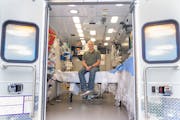 John Sauer, a cardiac arrest survivor, poses for a portrait inside the Minnesota Mobile Resuscitation Consortium, Tuesday, Sep. 19, 2023, at M Health 