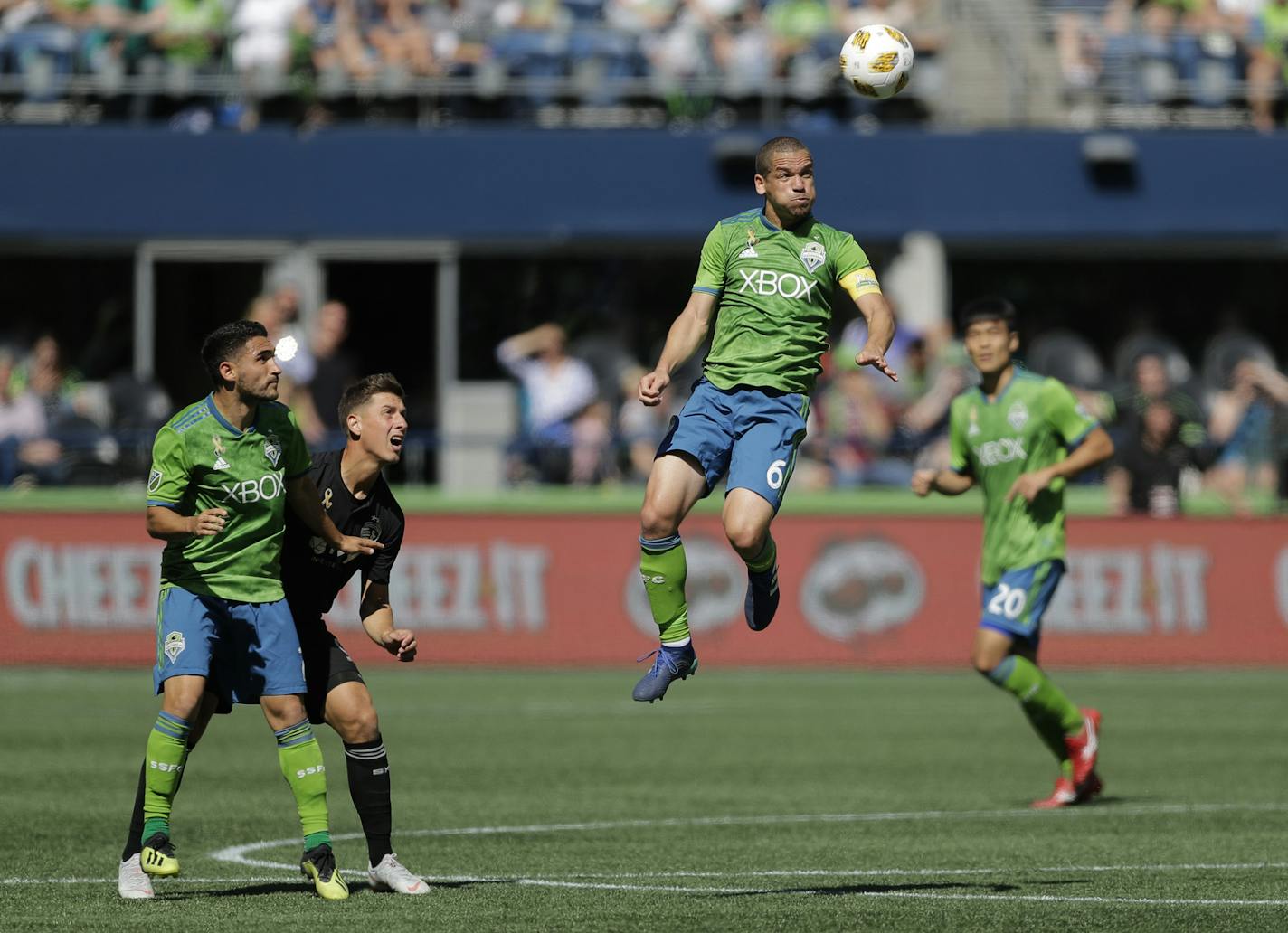 Midfielder Ozzie Alonso (6), newly acquired by Minnesota United, heads the ball during the second half of an MLS soccer match against Sporting Kansas City last Sept. 1 in Seattle.