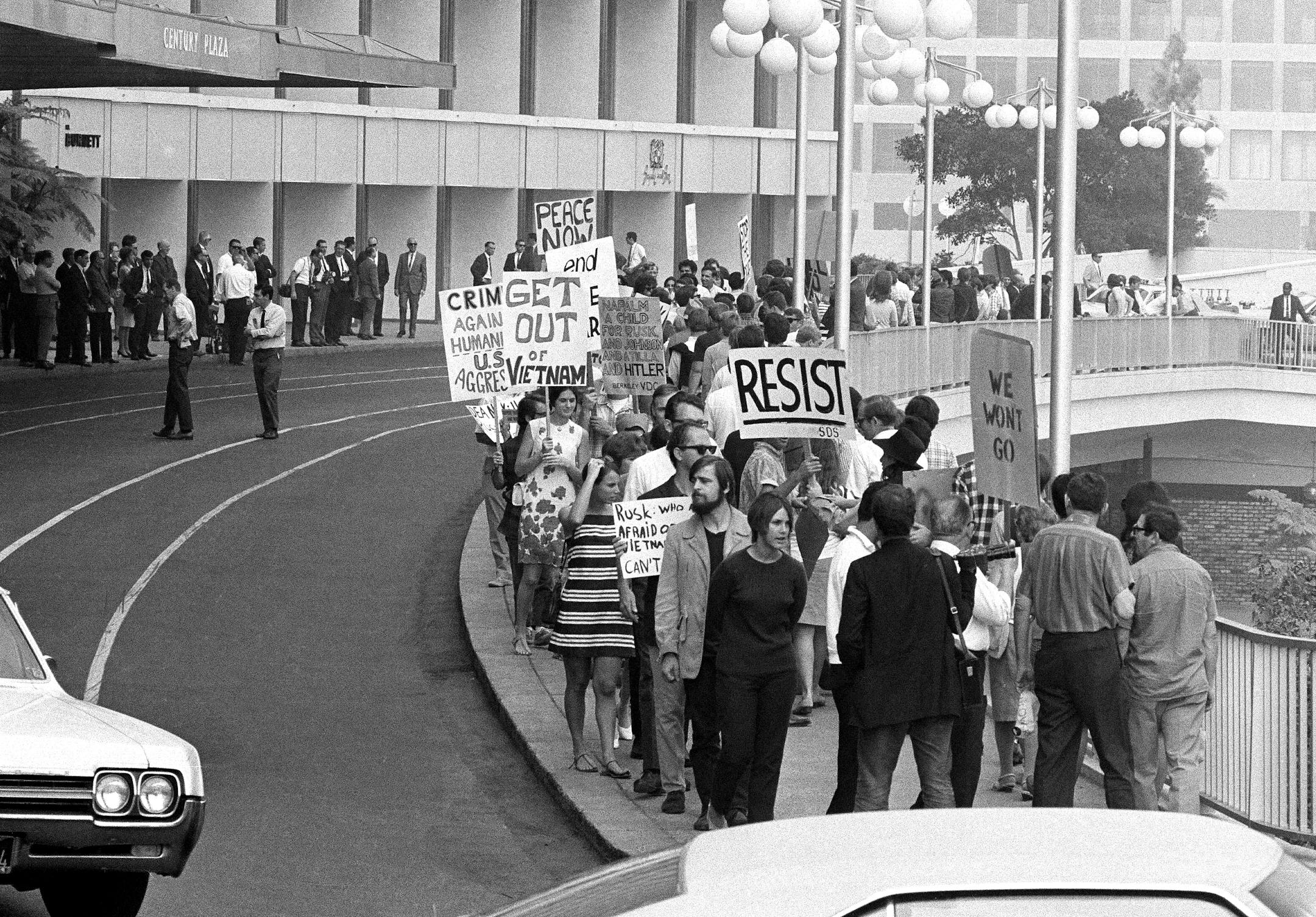 Anti-Vietnam War demonstrators protested in front of Century Plaza Hotel where then-Secretary of State Dean Rusk was speaking before the World Affairs Council in Los Angeles in October 1967. Pickets carried signs with phrases such as “Secretary of Hate” and “Rusk Kills Children for Profit.”