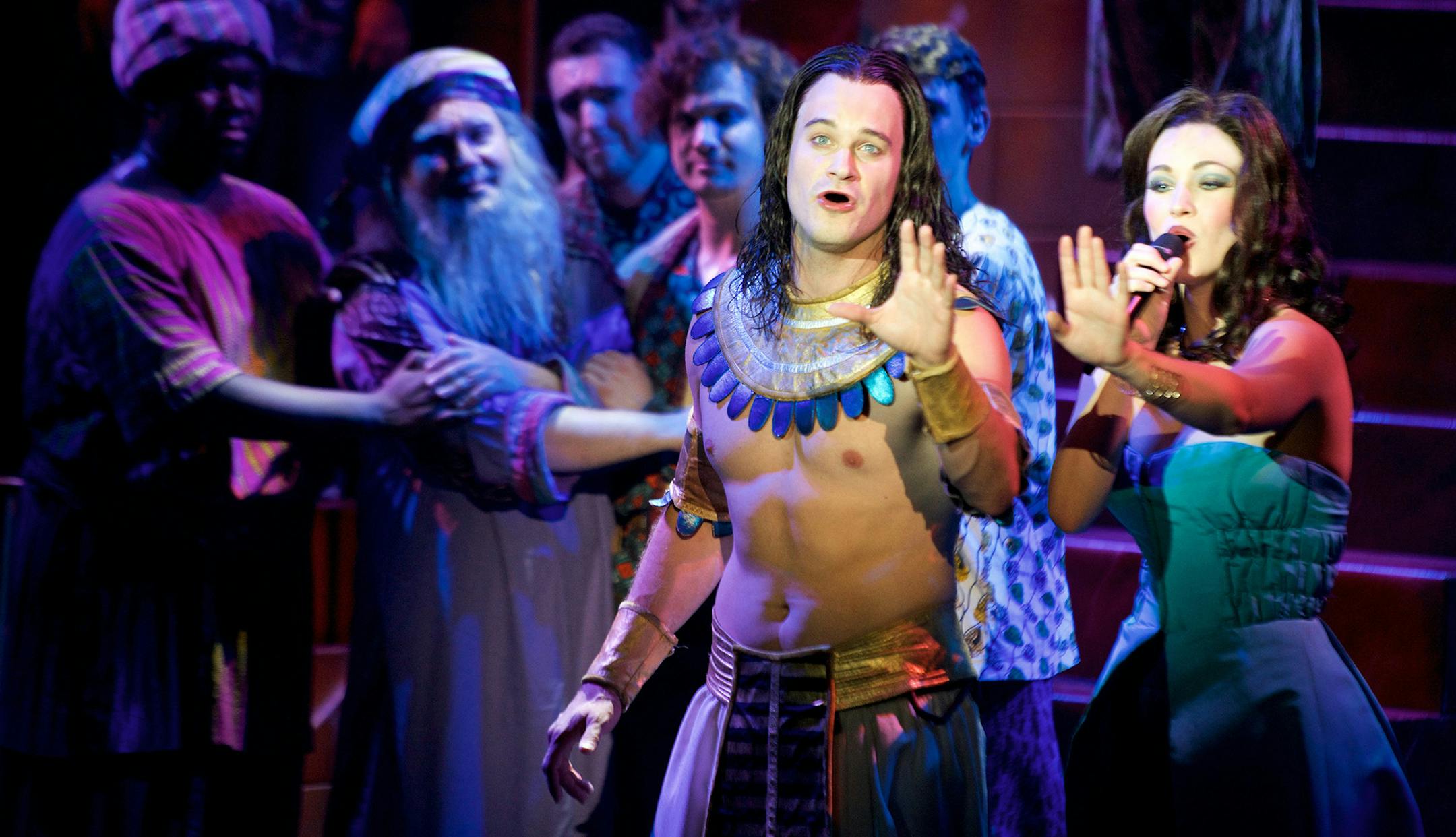 Daniel A. Swalec JC McCann as Joseph, Laura Helm as the Narrator in "Joseph and the Amazing Technicolor Dreamcoat."