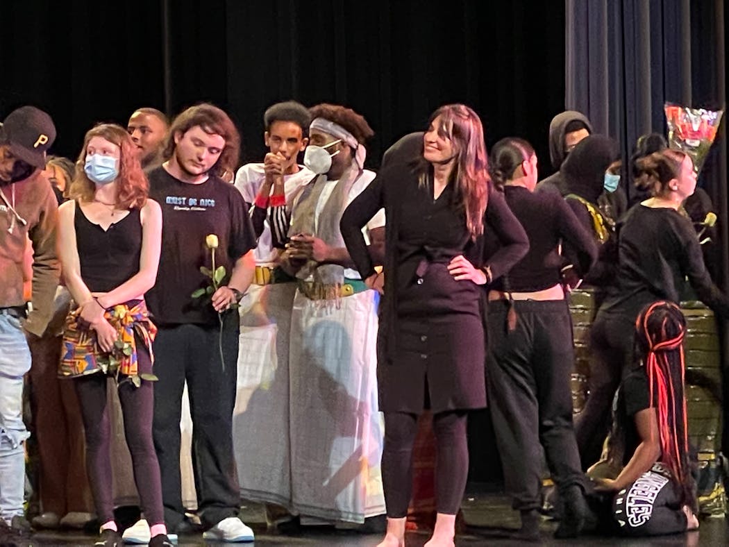 Nancy Nair, dance teacher at South High School in Minneapolis, takes the stage with students after their annual spring performance on May 26.