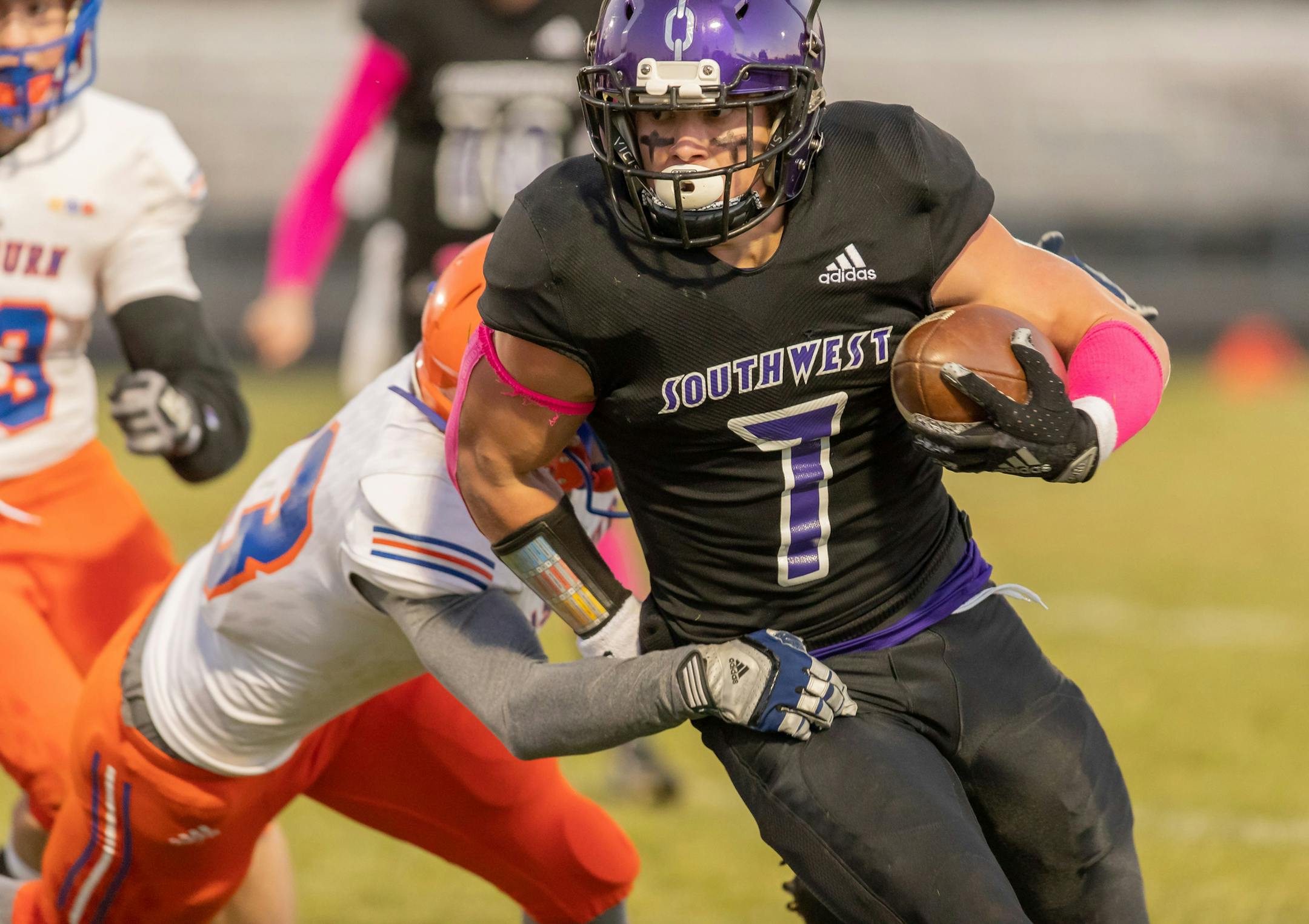 Nick Flaskamp of Minneapolis Southwest carried the ball in a game against Minneapolis Washburn. Photo by Steve Kotvis, f/go ORG XMIT: MIN2011091918440312