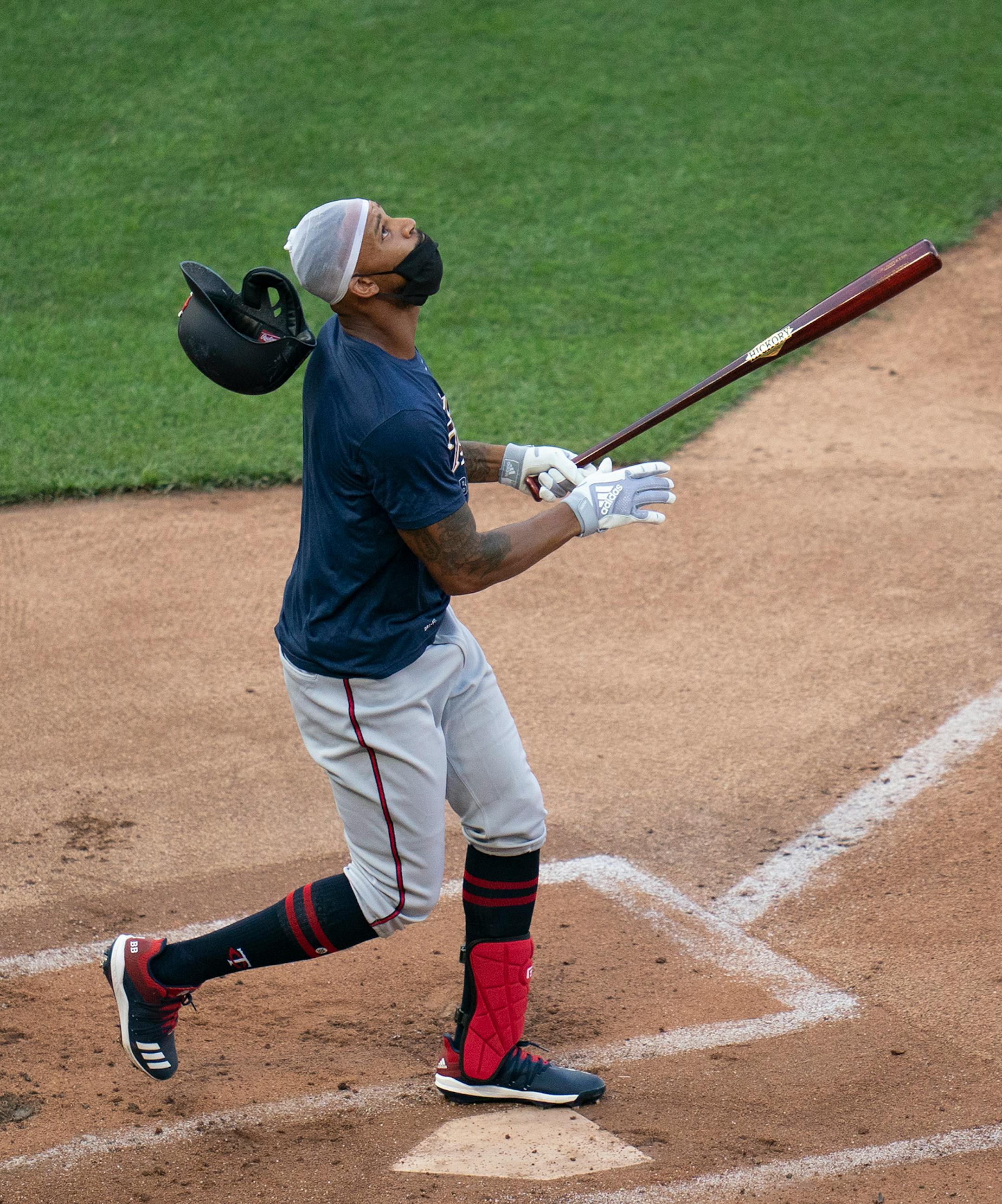 Minnesota Twins center fielder Byron Buxton (25) lost his helmet as he followed a fly ball while batting during a scrimmage at practice at Target Field in Minneapolis, Minn., on Wednesday, July 8, 2020.