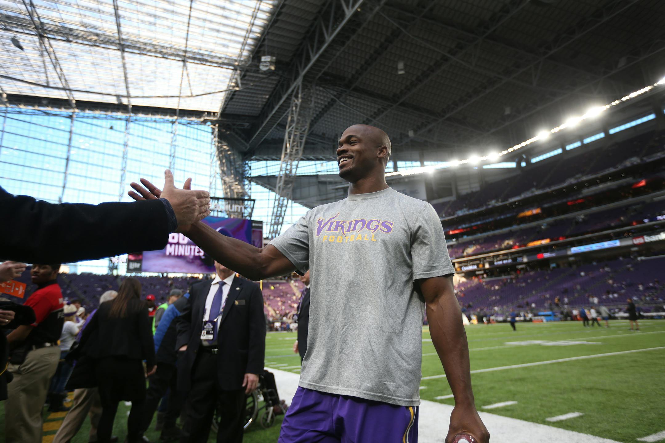 Minnesota Vikings running back Adrain Peterson shook hands with a fan before kick off at U.S. Bank Stadium Sunday December 18,2016 in Minneapolis, MN. ]The Minnesota Vikings hosted the Indianapolis Colts . Jerry Holt / jerry. Holt@Startribune.com