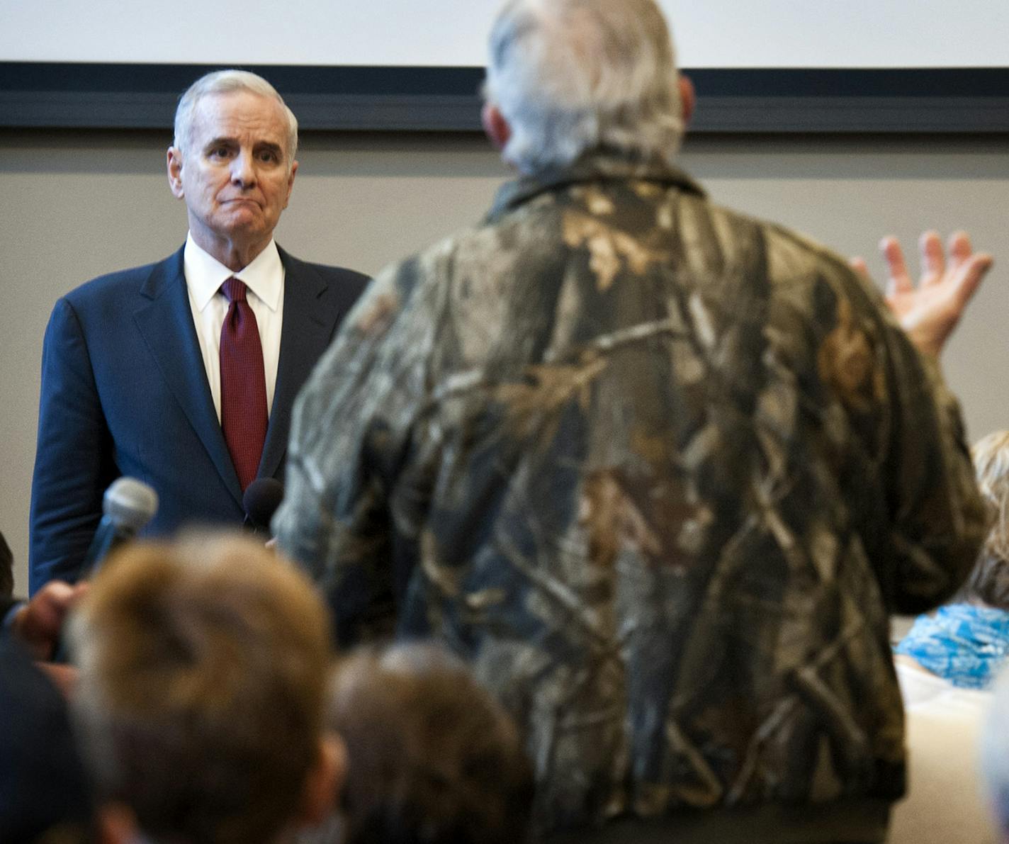 Governor Mark Dayton took questions from a standing room only crowd of a couple hundred people in his first &#x2018;Meeting with Mark&#x2019; in a town hall meeting in Duluth to talk about his budget proposal. Wednesday, March 20, 2013. With him on the right is Revenue Commissioner Myron Frans. ] GLEN STUBBE * gstubbe@startribune.com