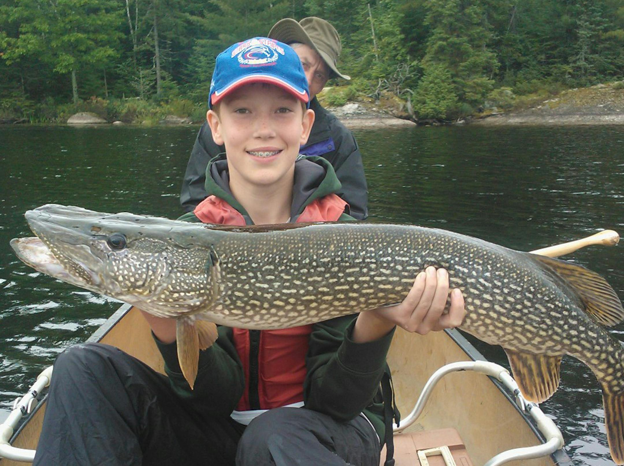 AWESOME ANGLER Ben Murray, 12, of Minneapolis, caught and released this 39-inch northern while fishing in Quetico Provincial Park in Ontario with his father and three friends. Ben also caught 36- and 31-inch northerns. "Ben was the only one in our group to hit a "grand slam" (northern, walleye, smallmouth bass and lake trout),'' said his dad, Dan. "Ben is an awesome fisherman.''