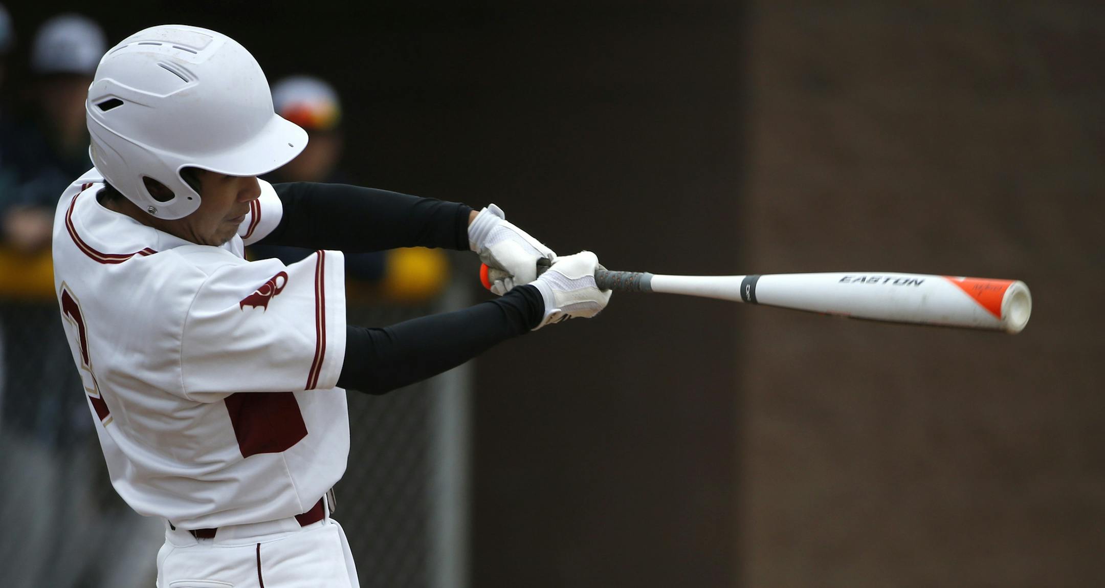Lakeville's Jon Saign hit and scored a runr during their game against Rosemount. ] (KYNDELL HARKNESS/STAR TRIBUNE) kyndell.harkness@startribune.com Lakeville South vs Rosemount in Lakeville Min., Wednesday, April 8, 2014.