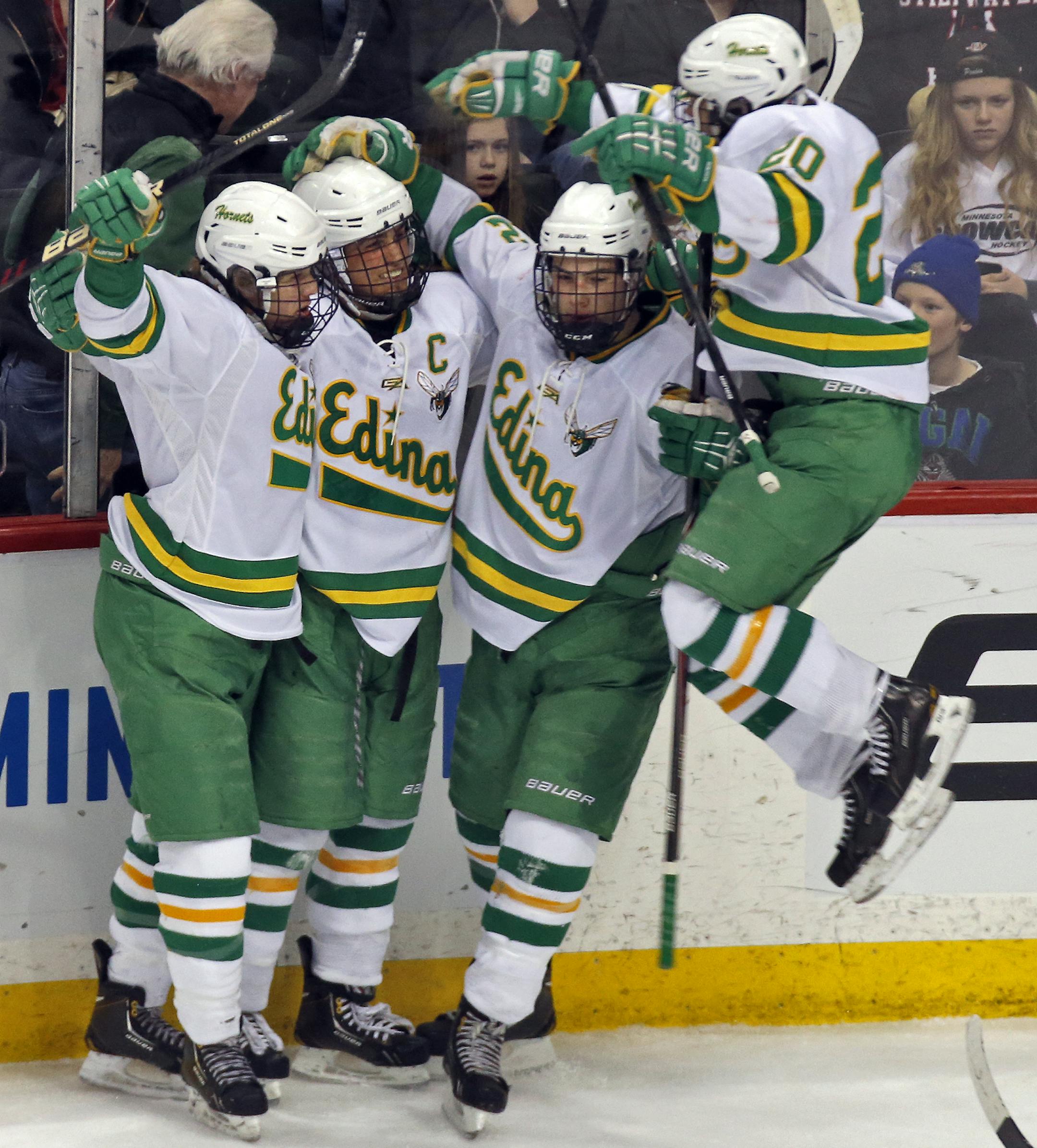 Edina players celebrate Tyler Nanne's (2nd from left) 3rd goal of the game in first period action. ] Boys State Highschool Hockey Tournament - Class 2A - Stillwater Ponies vs. Edina Hornets. (MARLIN LEVISON/STARTRIBUNE(mlevison@startribune.com)