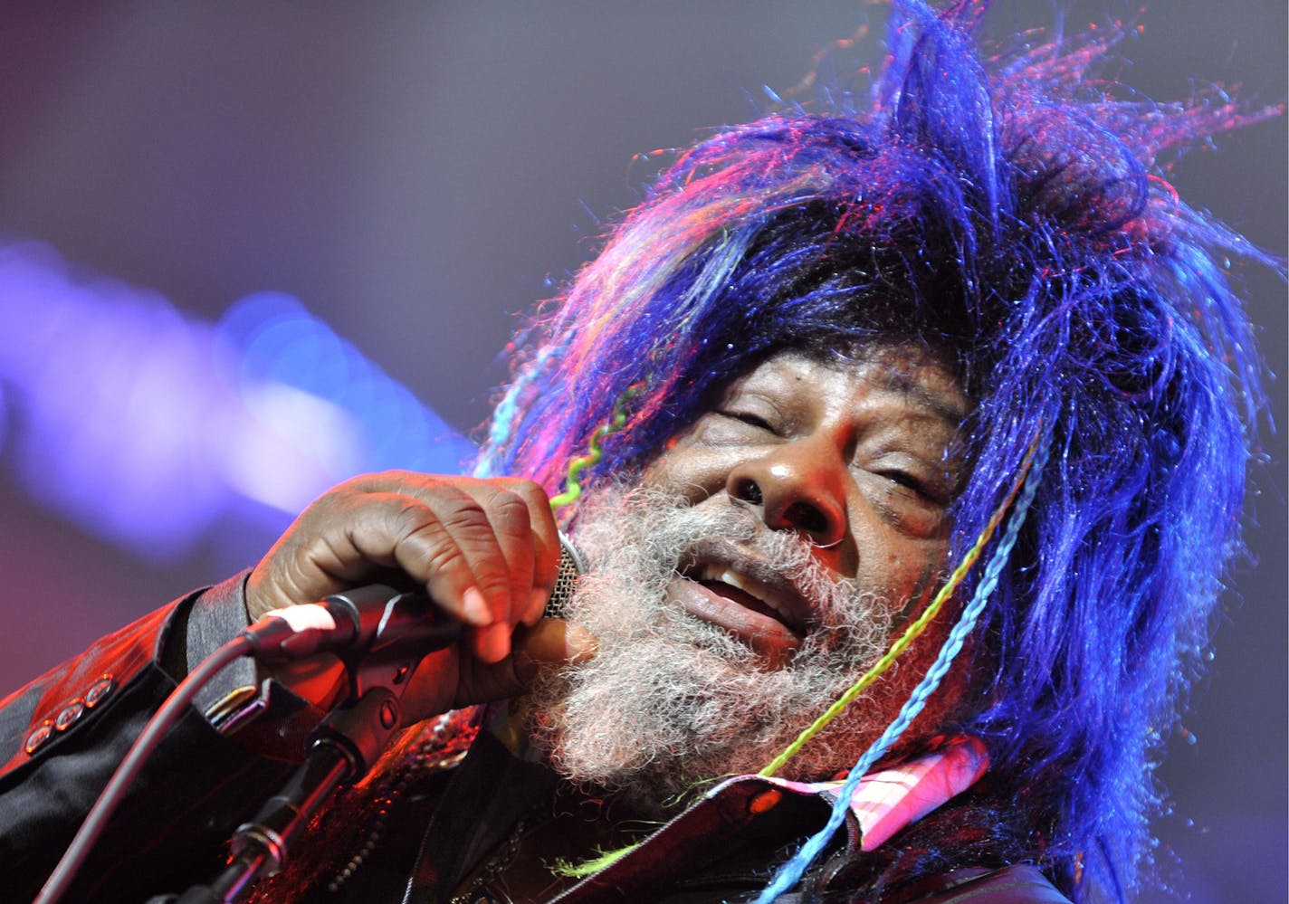 FILE - In this Nov. 12, 2009 file photo, American singer, songwriter and music producer George Clinton performs with the funk, soul and rock music collective Parliament-Funkadelic on stage at the Avo Session in Basel, Switzerland. Clinton and the Black Eyed Peas have settled a lawsuit in which the funk pioneer accused the pop group of improperly sampling his music. (AP Photo/Keystone, Georgios Kefalas, File) ORG XMIT: LA106