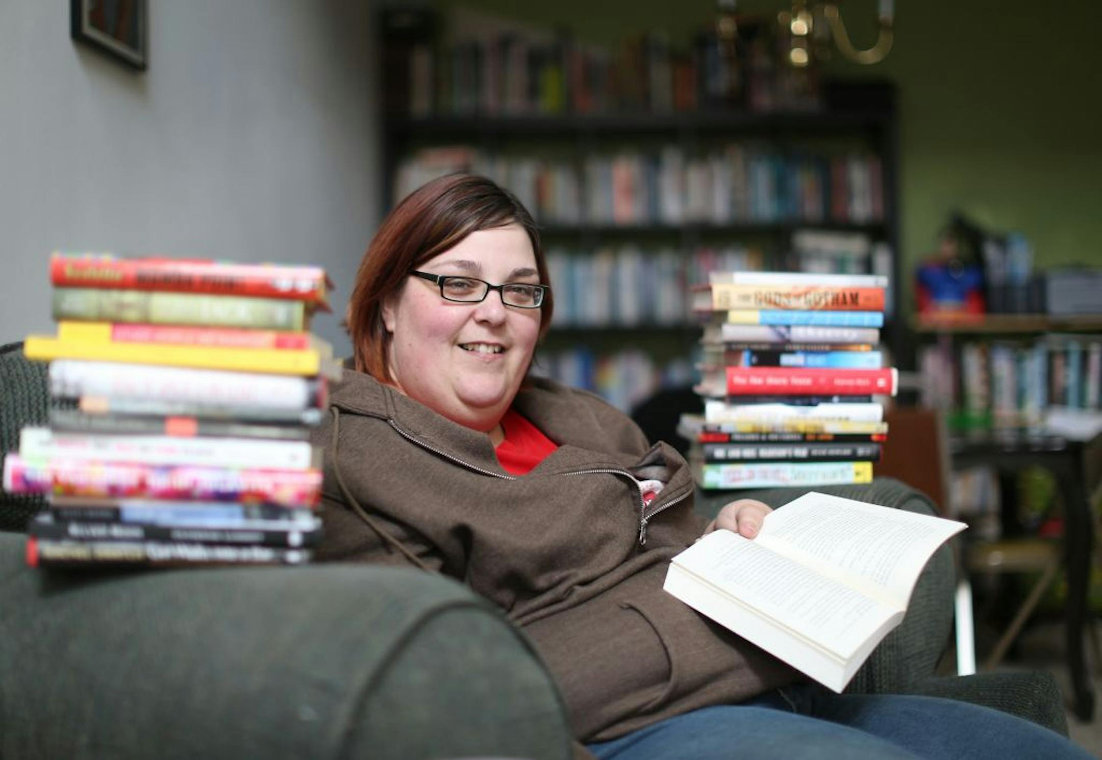Jodi Chromey prefers to read actual books and likes the break from being wired while she reads. She was photographed at home on Monday, April 30, 2012 in Shakopee, Minn.