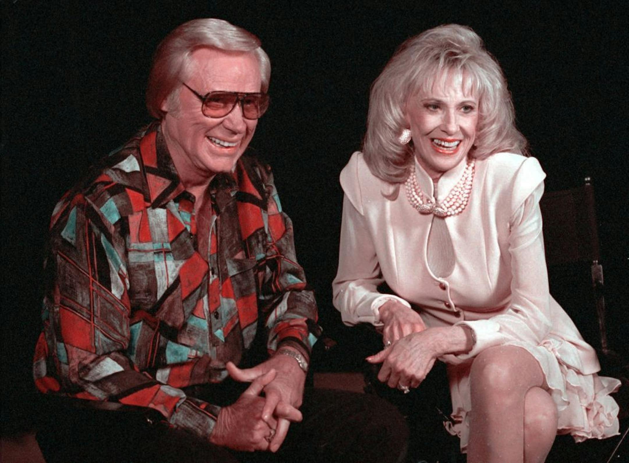 FILE -- Country music legends George Jones, left, and Tammy Wynette, right, announce they are reuniting for an album and concert tour Tuesday, April 18, 1995, in Nashville, Tenn. Jones and Wynette were married from 1968 to 1974.