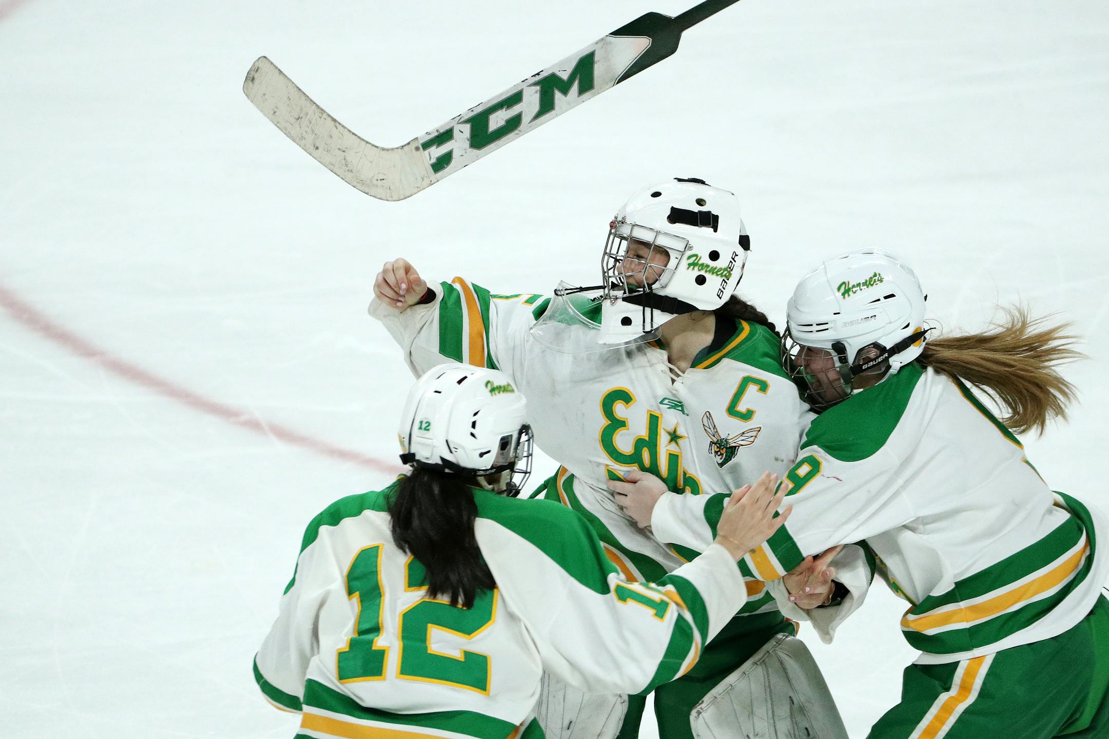 The Edina girls' hockey team, shown winning the Class 2A title a year ago, is ranked No. 1 going into sectional play this season.