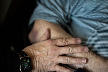 Panda Olson of Ham Lake visits her 86-year-old father, Ronald Lund at the White Pine Advanced Memory Care on Wednesday, Sept. 7, 2022. Panda was horri