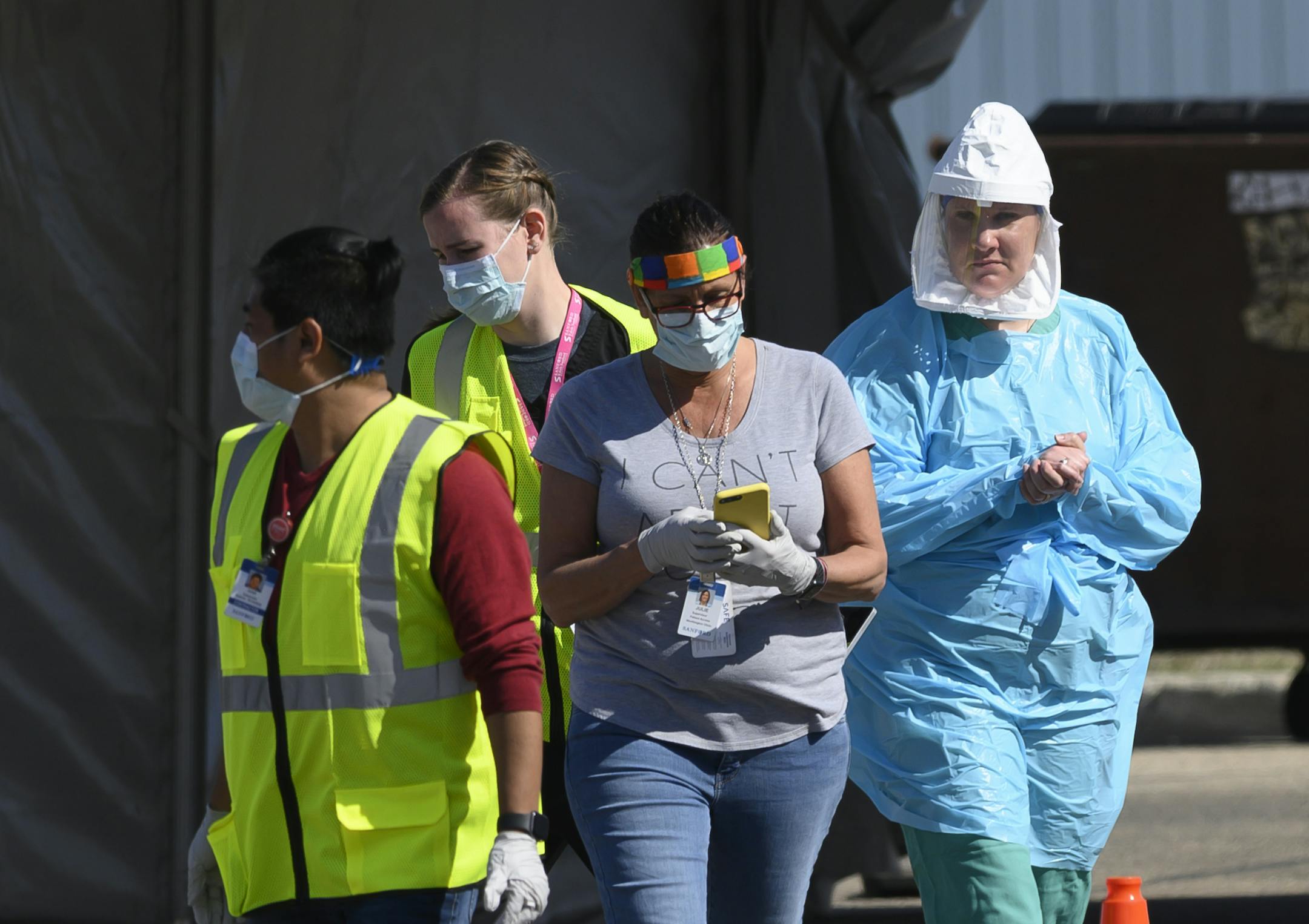 Medical workers administered drive-up COVID-19 tests Saturday, April 18, outside the Sanford Worthington Clinic.