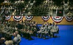 FILE -- Service members before President Donald Trump delivers an address to the nation at Fort Myer in Arlington, Va., Aug. 21, 2017. Trump�s decla