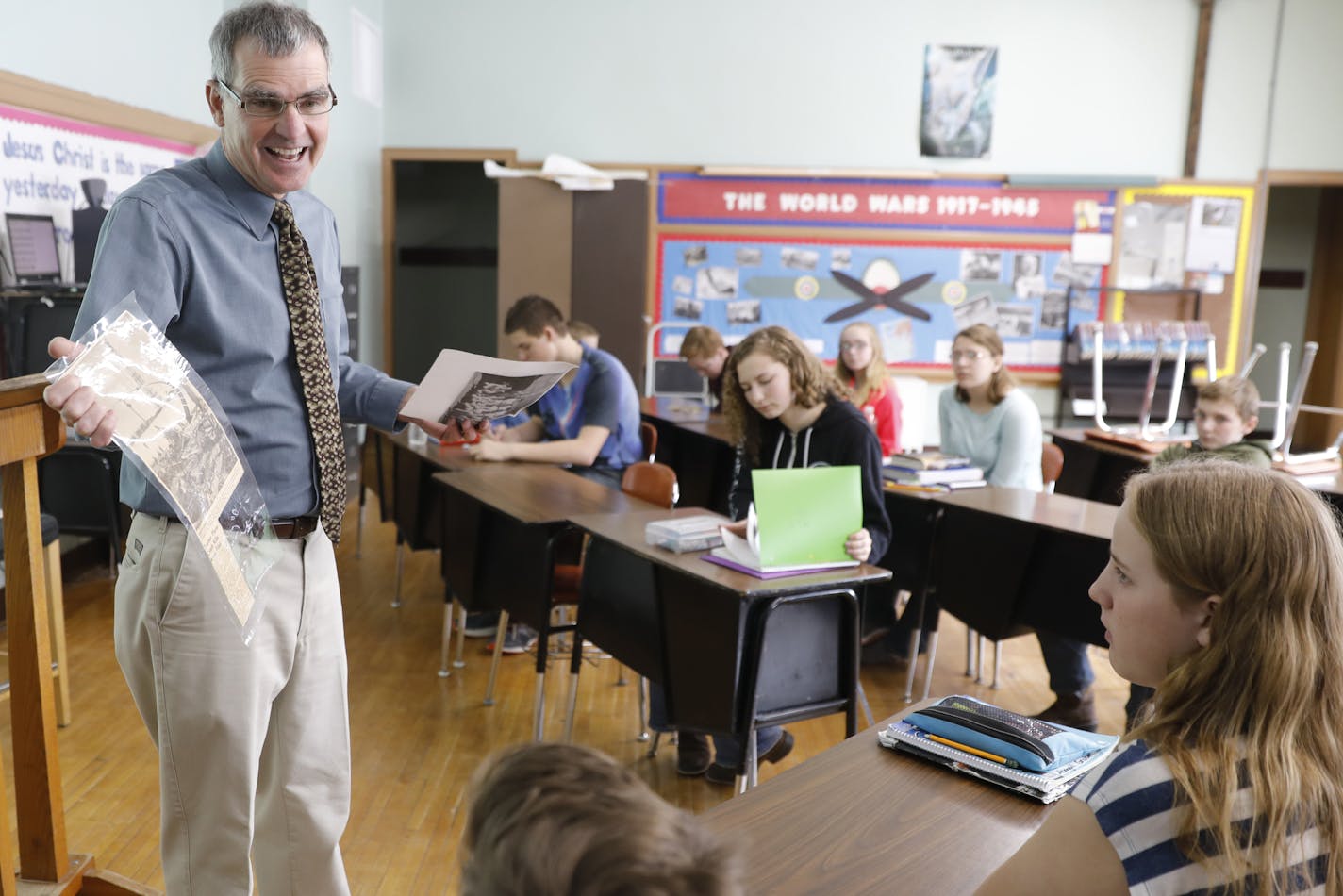 "It's a way to honor veterans. It's not just stuff in books. It's real people here,"
history teacher Dean Scheele said. Here, he and his students prepared to meet Don Givens' nephew in Chicago.