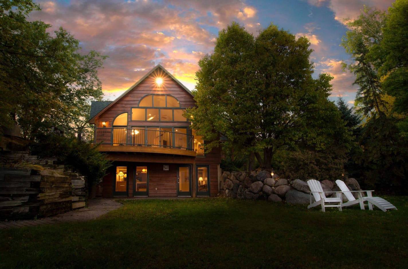 This home is located on the point of Enchanted Island in Lake Minnetonka.