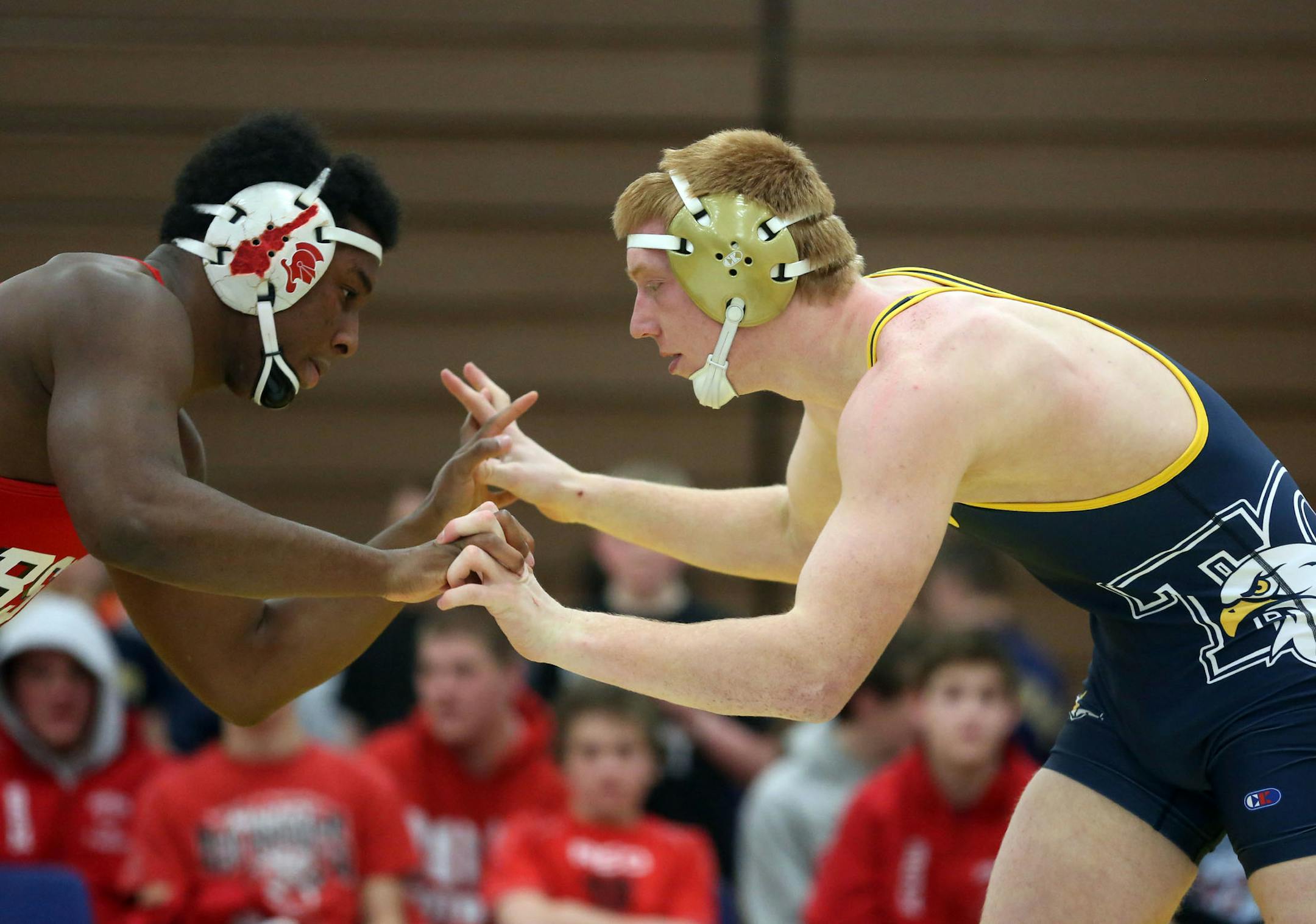 Totino-Grace's Lance Benick, right, is a two-time state champion. He is 30-0 this season and 107-4 in his high school career.