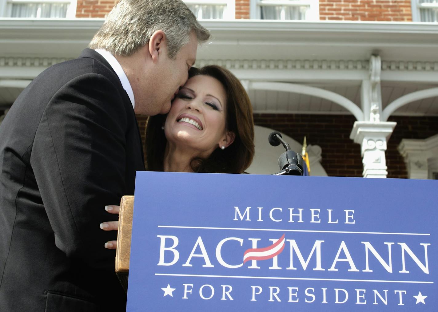 Republican presidential candidate Michele Bachmann got a kiss and hug from husband Marcus as she officially kicked off a three-state campaign announcement tour in her birth state of Iowa on Monday, June 27, 2011.