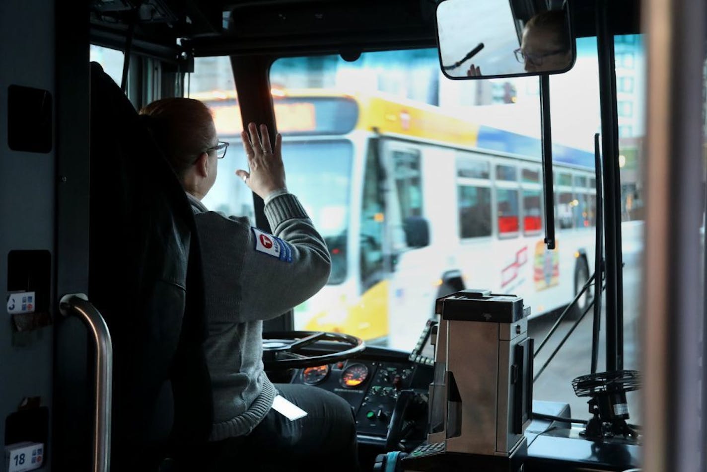 Metro Transit driver Deb Sievers heads along her route Friday, Dec. 14, 2017, in Minneapolis. Workers overwhelmingly approved a new contract with the Metropolitan Council Monday afternoon, avoiding a strike that would have paralyzed the Twin Cities' transit system during the Super Bowl.