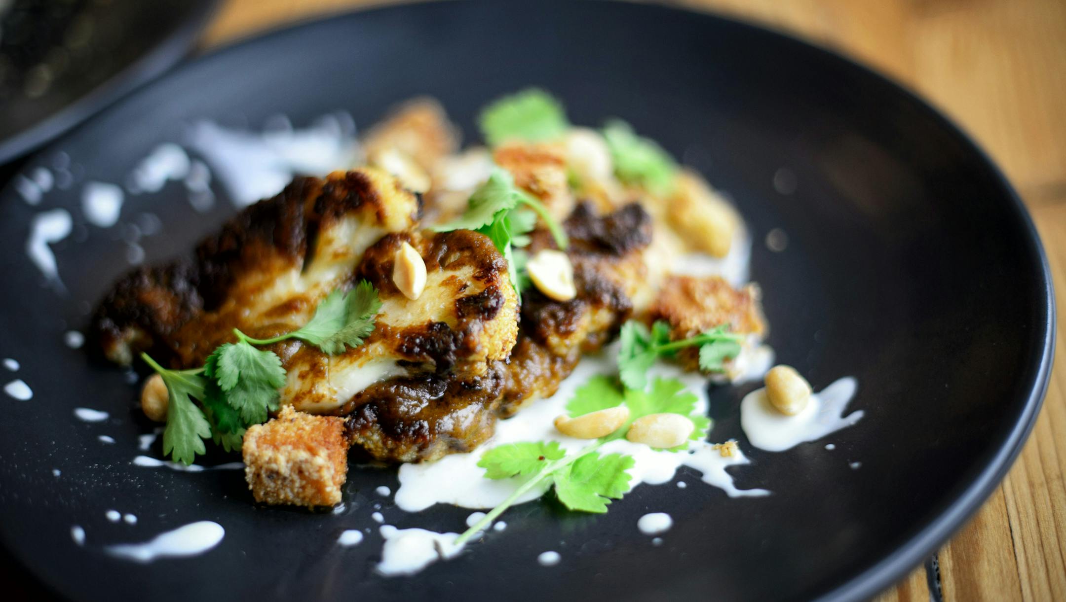 Cauliflower with tofu, vegan XO sauce. ] GLEN STUBBE * gstubbe@startribune.com Friday, January 8, 2015 Co-op Creamery Cafe, the new breakfast-lunch-dinner restaurant launched by the Seward Coop and featuring sharp, lively cooking by chef Lucas Almendinger.