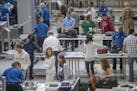Travelers made their way through the TSA security at Terminal 1 at the Minneapolis/St. Paul International Airport, Thursday, May 23, 2019 in Bloomingt