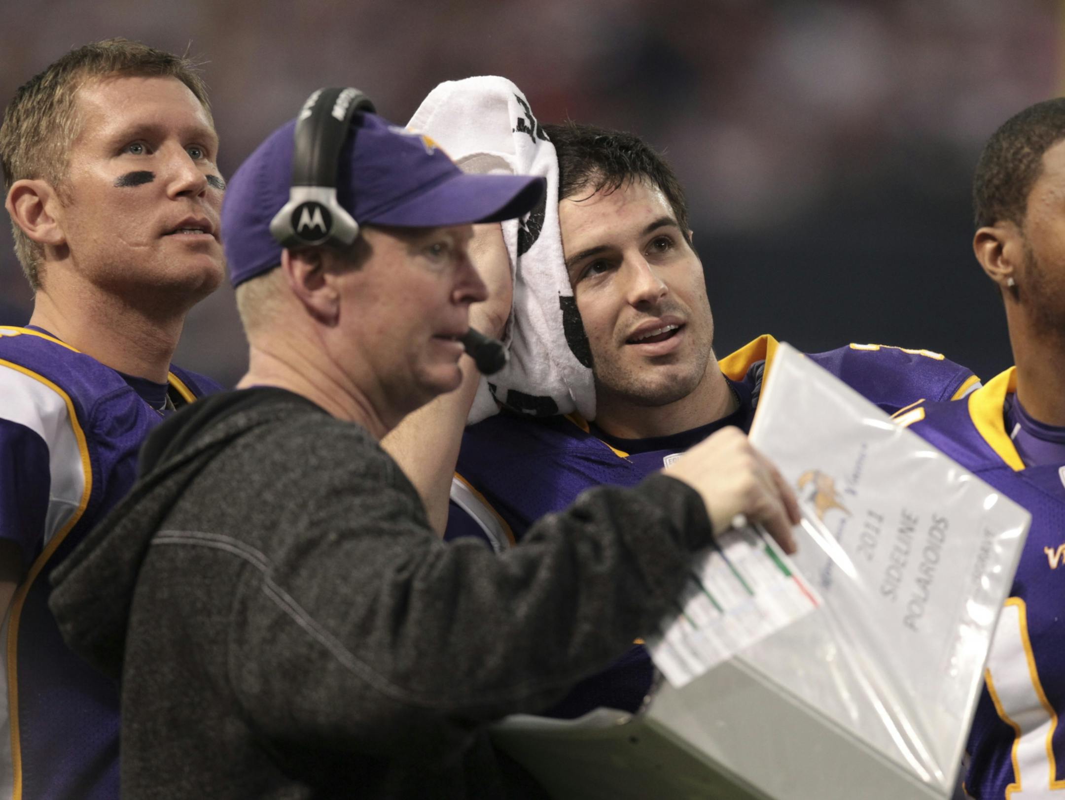 Offensive coordinator Bill Musgrave and quarterback Christian Ponder during Sunday's game against Denver. Sage Rosenfels is in the background.