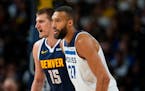Timberwolves center Rudy Gobert (27) will have his hands full defending against the Nuggets' two-time NBA MVP, center Nikola Jokic (15), but he'll get