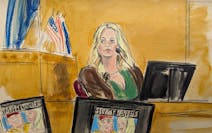 Stormy Daniels testifies on the witness stand as a promotional image for one of her shows featuring an image of Trump is displayed on monitors in Manh