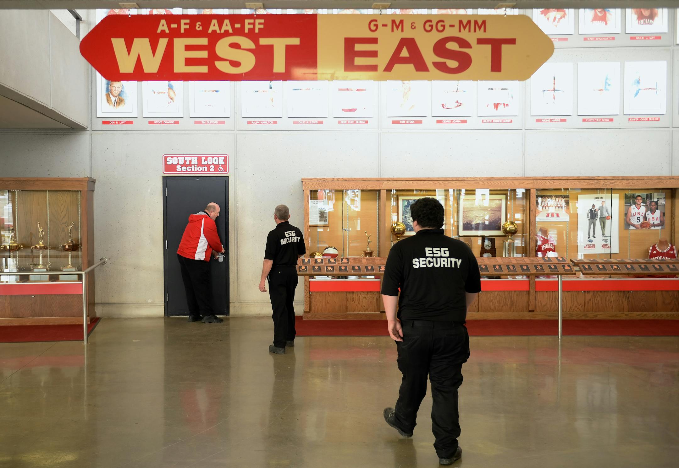The Indiana Iowa men's basketball game was postponed Tuesday, Feb. 18, 2014 due to a piece of metal falling from the facade in the northwest corner of Assembly Hall in Bloomington, Ind. Tuesday, Feb. 18, 2014. No makeup date was announced. (AP Photo/The Herald-Times, Chris Howell)