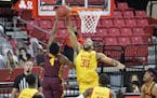 Gophers guard Jamal Mashburn Jr. had his shot rejected by Maryland forward Galin Smith during the first half Sunday.