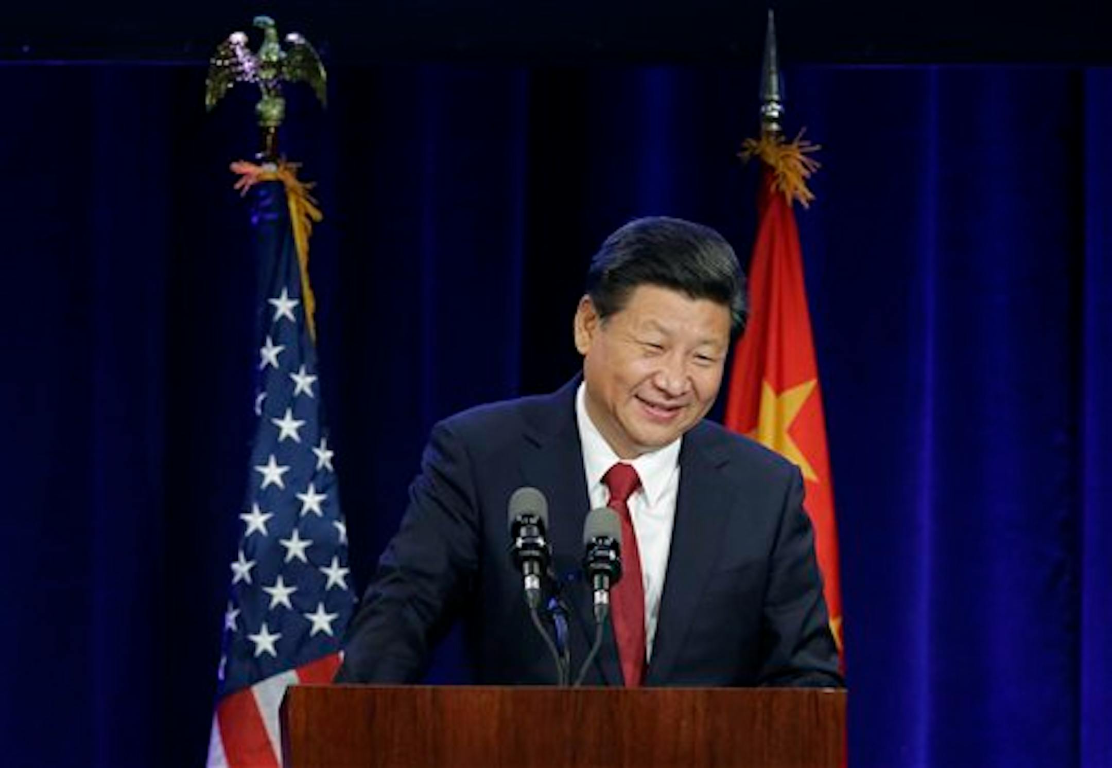 Chinese President Xi Jinping speaks Tuesday, Sept. 22, 2015, at a banquet in Seattle. Xi was in Seattle on his way to Washington, D.C., for a White House state dinner on Friday. (AP Photo/Ted S. Warren)